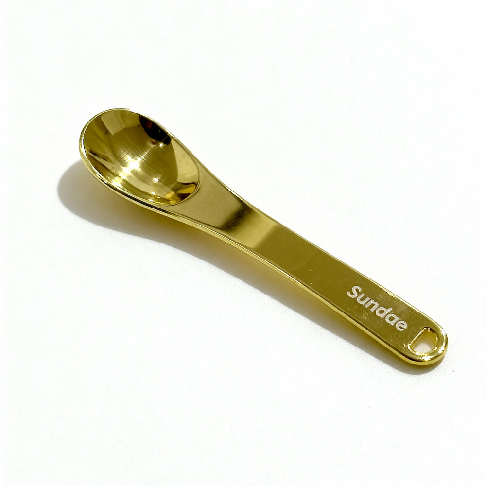 
                      
                        Gold Cosmetic Spoon
                      
                    